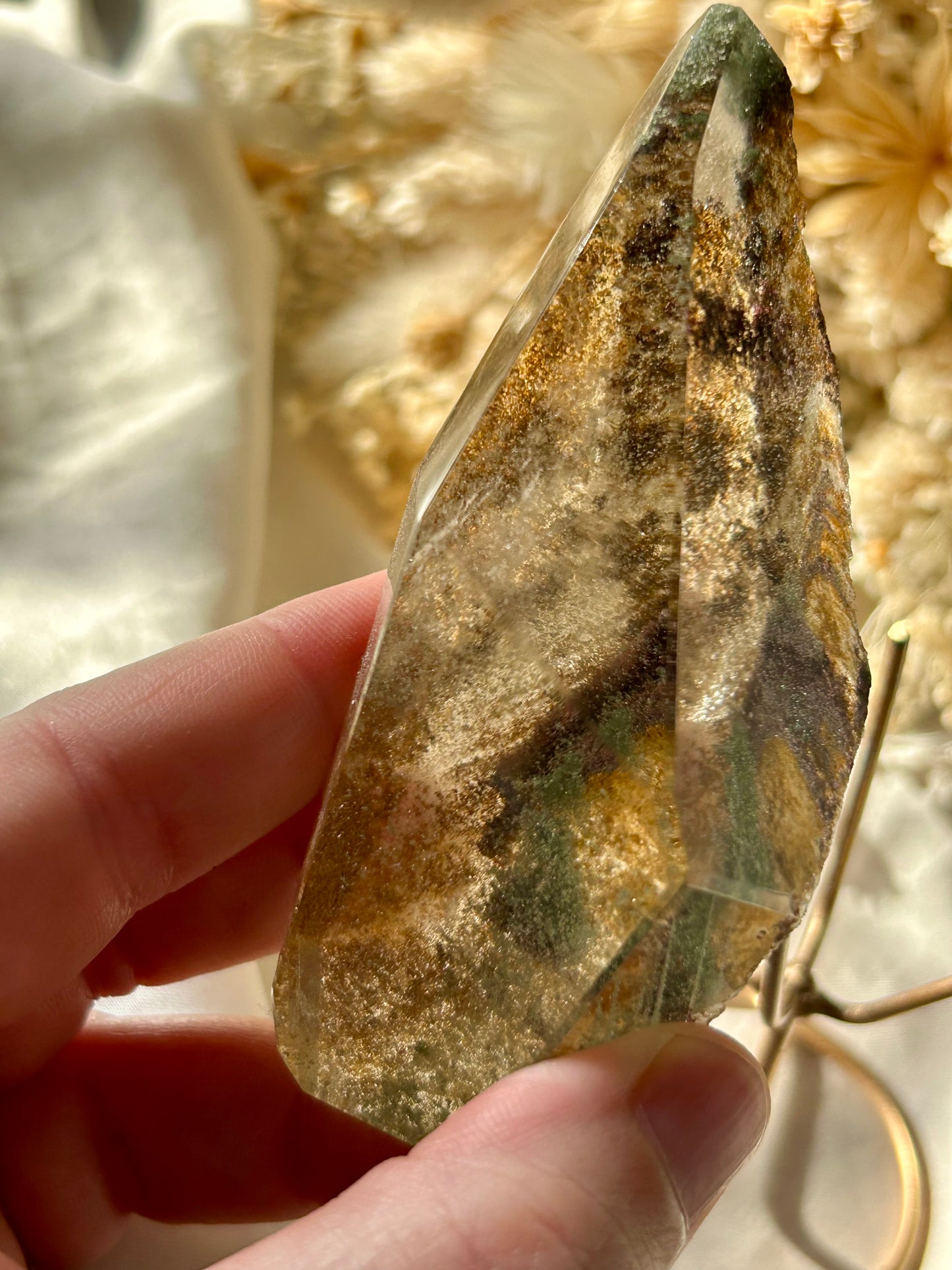 Large semi polished colourful Lodolite on gold display stand
