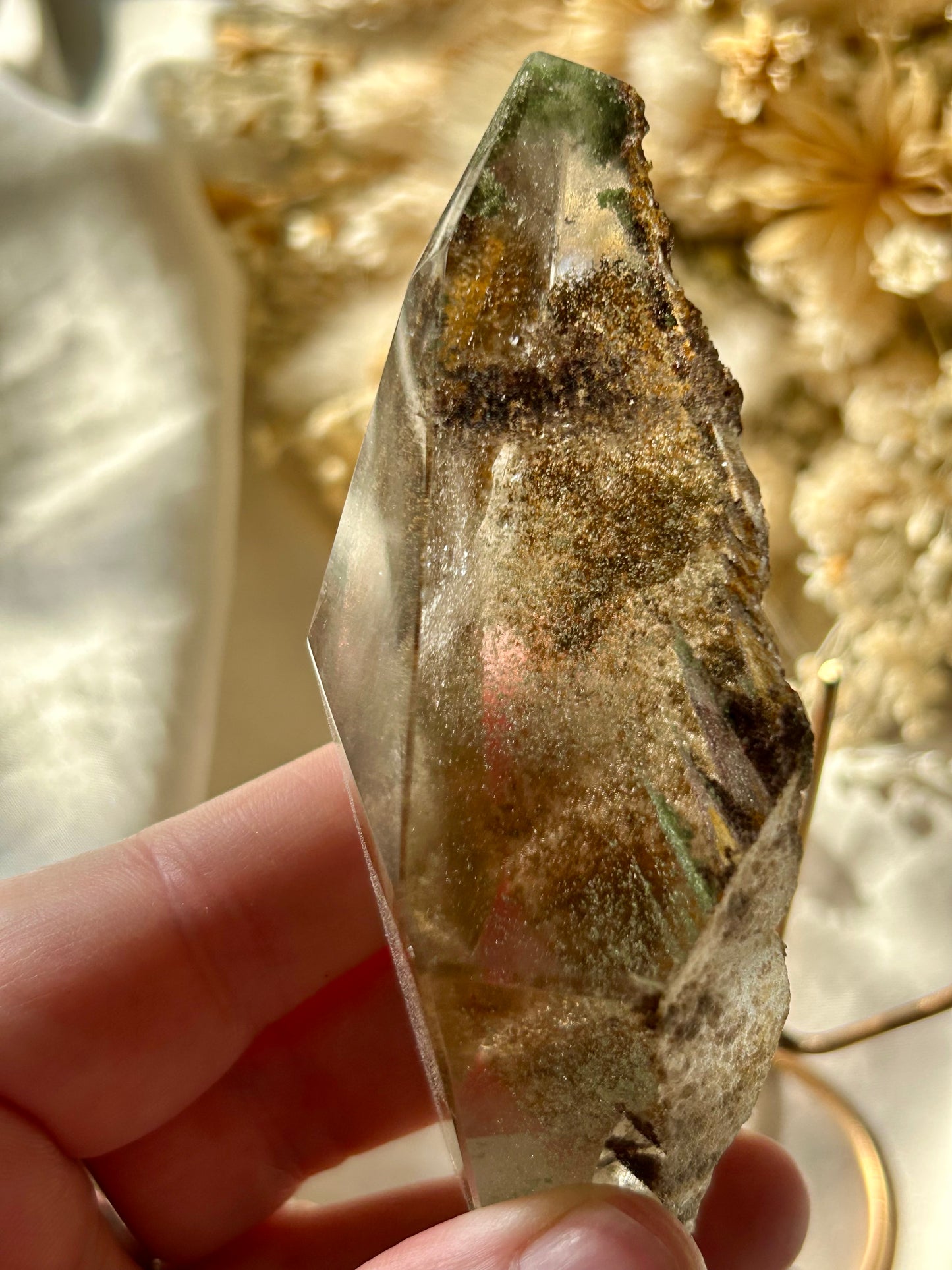 Large semi polished colourful Lodolite on gold display stand