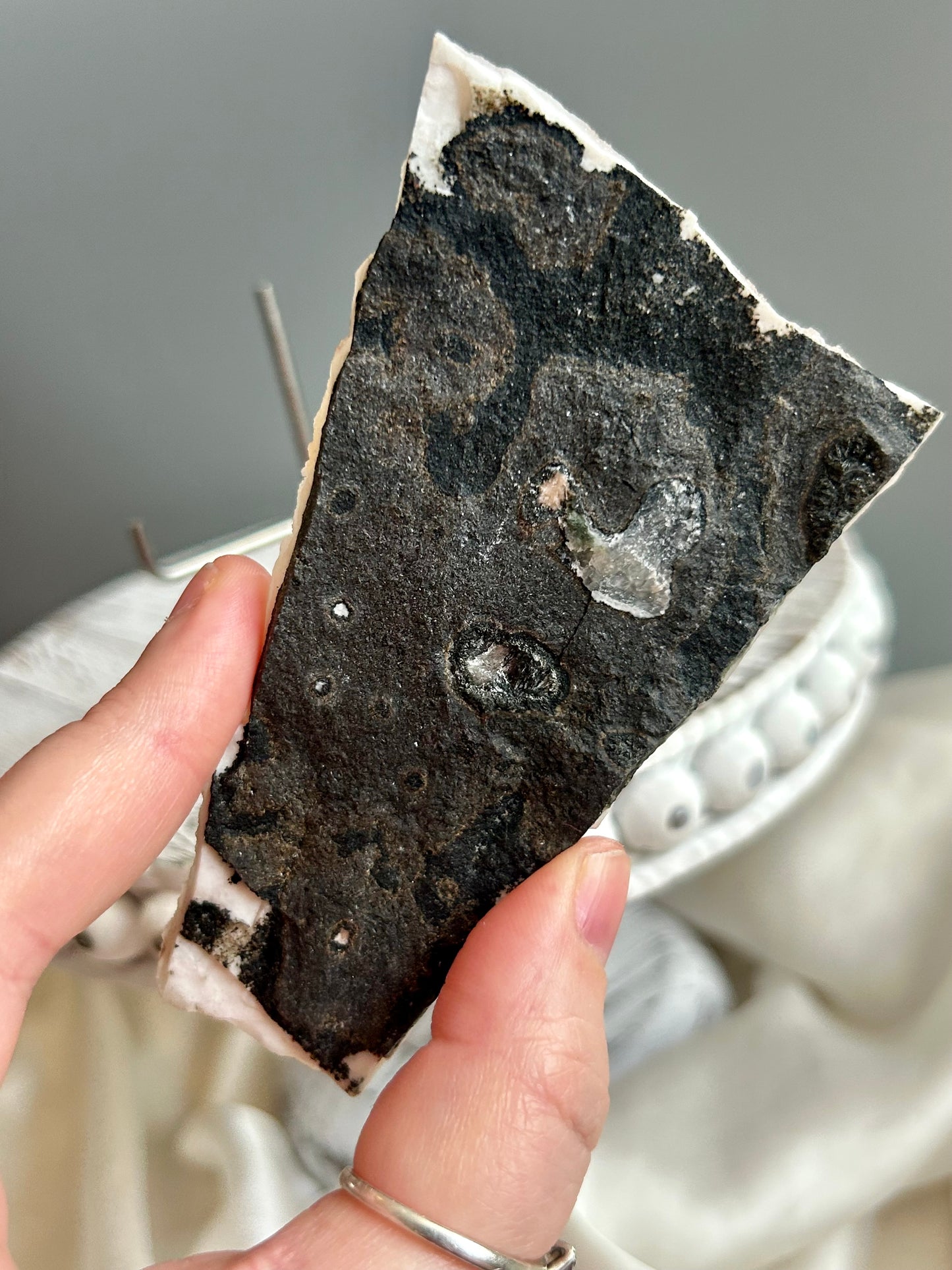 Clear apophyllite stalactite cluster on display, sparkling crystal formation