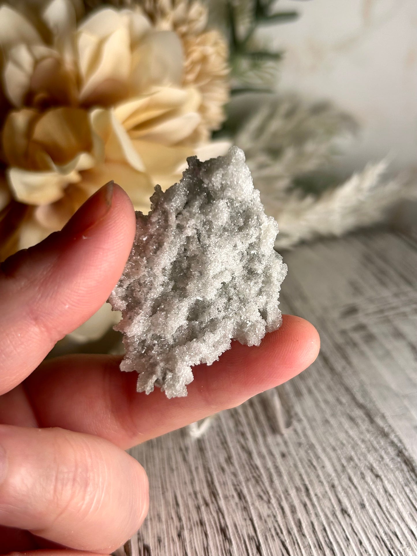 Mini Natural Green Apophyllite crust crystal cluster with sparkling druzy points on display stand from India
