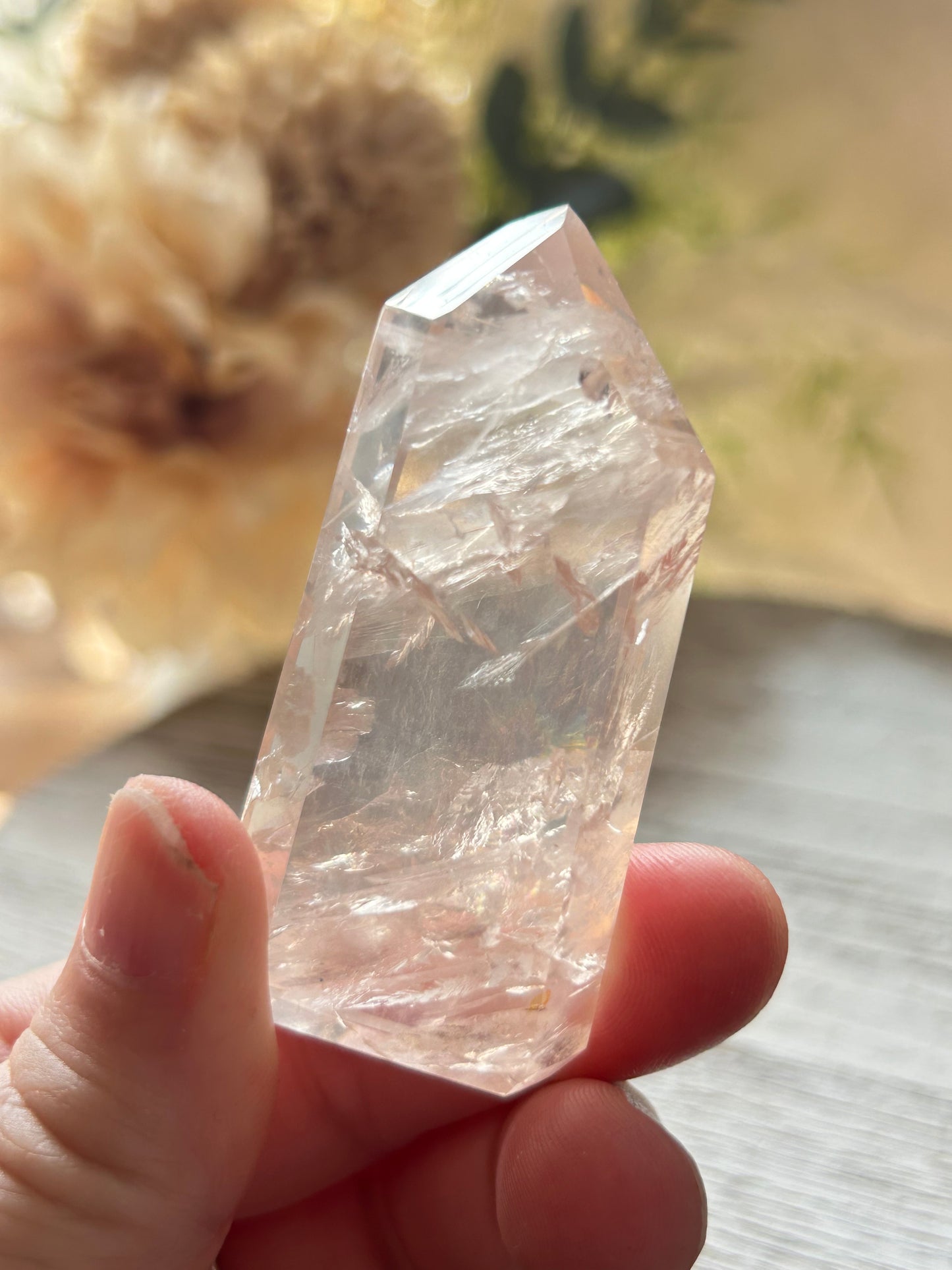 Beautiful polished Rose Quartz with calming blush tones, natural clarity, and glossy crystal finish.