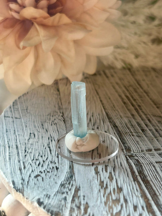 Natural Aquamarine rods from Pakistan with soft blue crystal formations and elongated natural growth.