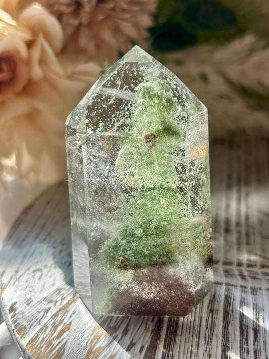 Inclusion Quartz Tower with natural mineral inclusions, polished clear Quartz, and unique internal crystal formations.