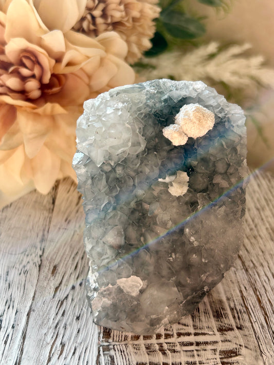 Natural Okenite on Grey Chalcedony with fibrous white formations and natural basalt matrix.