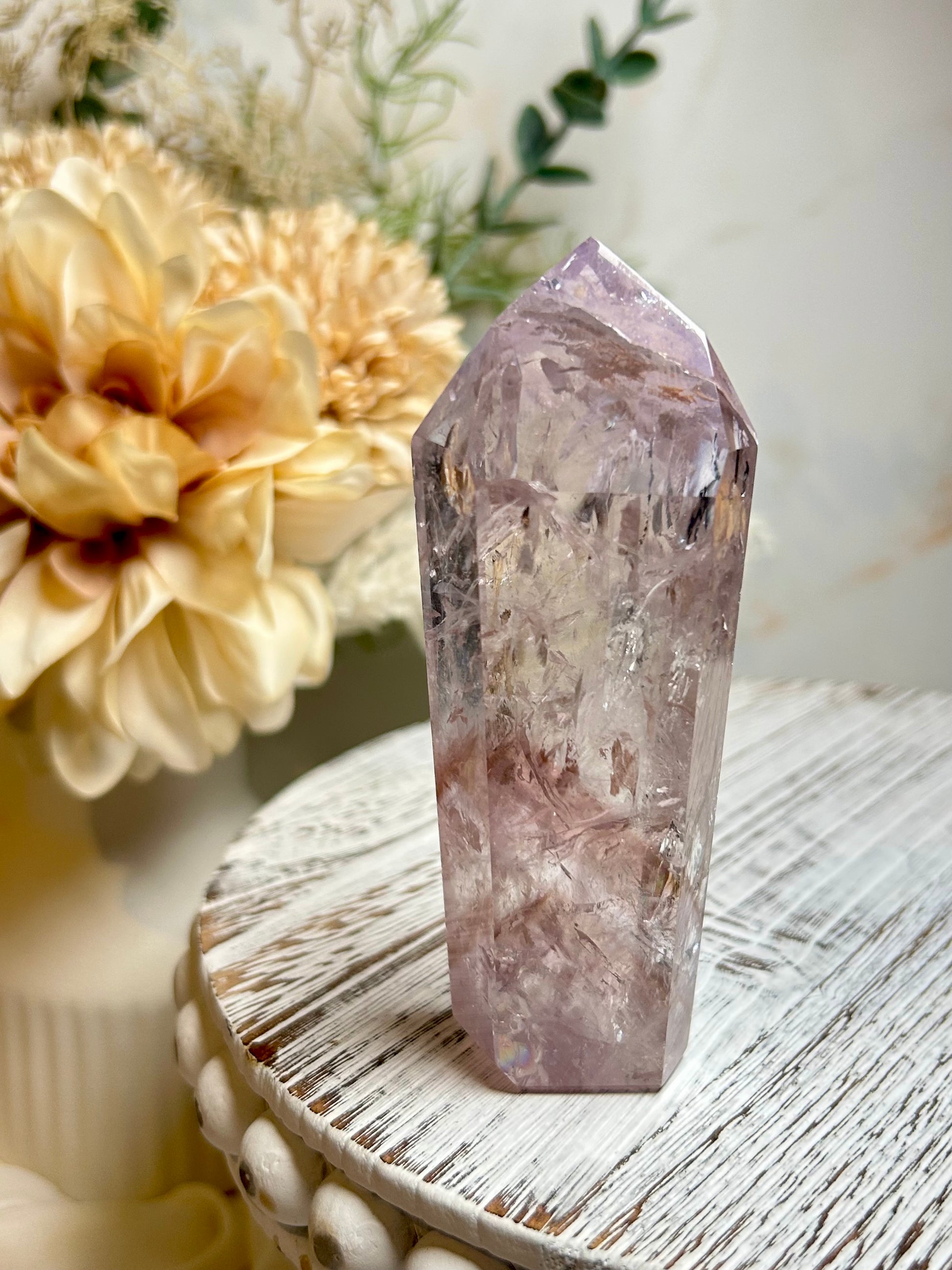 Powellite included Amethyst crystal point with natural lavender tones and internal mineral formations