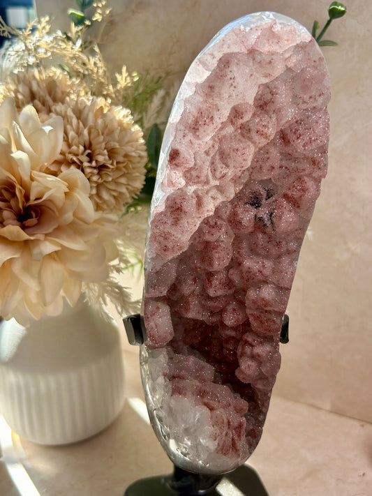 Large Pink Sugar Rainbow Amethyst statement piece with sparkling blush druzy crystal on a custom display stand.