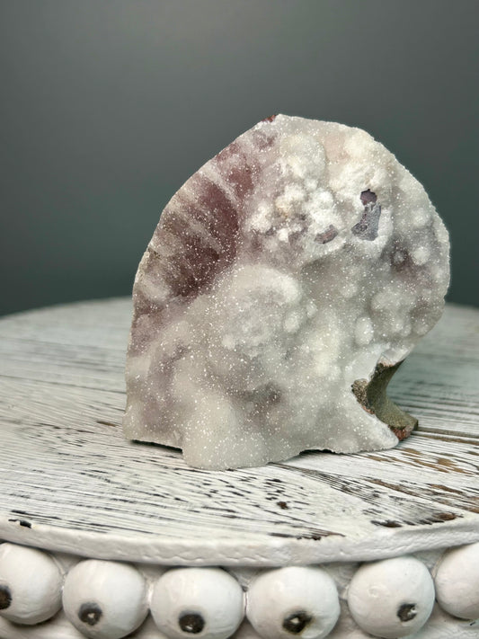 Grey Chalcedony specimen with layered colour growth and gentle shimmer