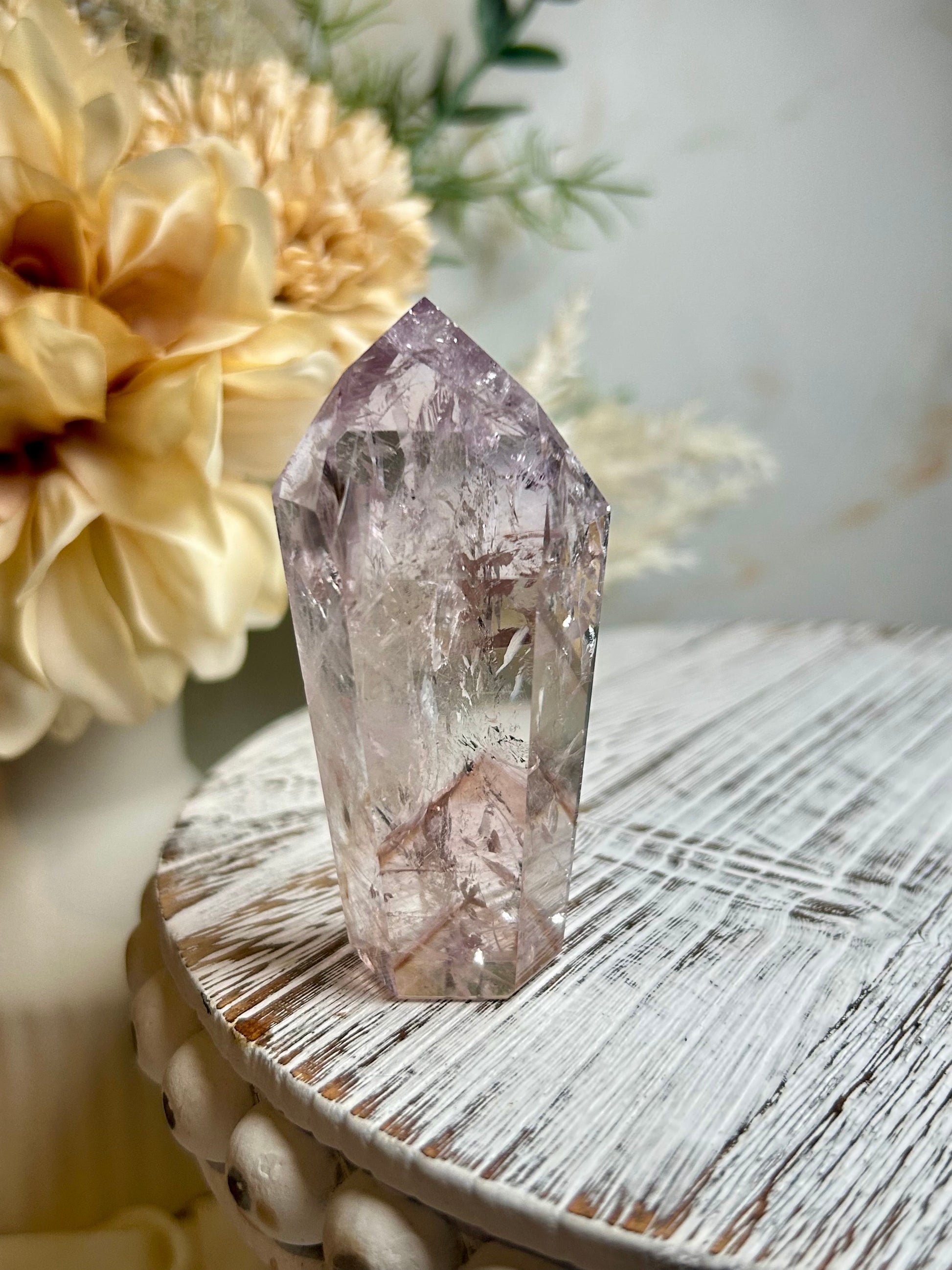 Powellite included Amethyst crystal point with natural lavender tones and internal mineral formations