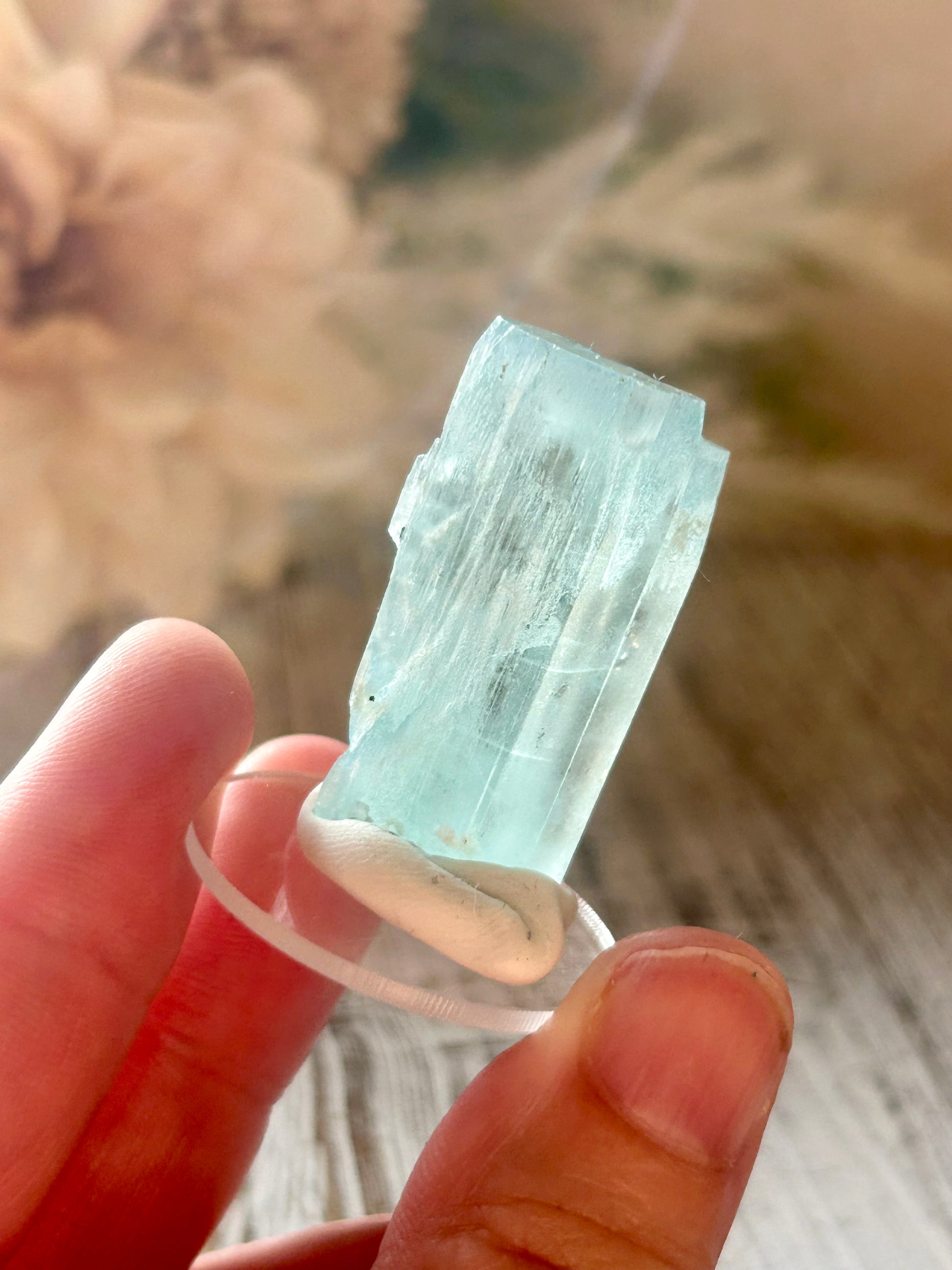 Natural Aquamarine rods from Pakistan with soft blue crystal formations and elongated natural growth.