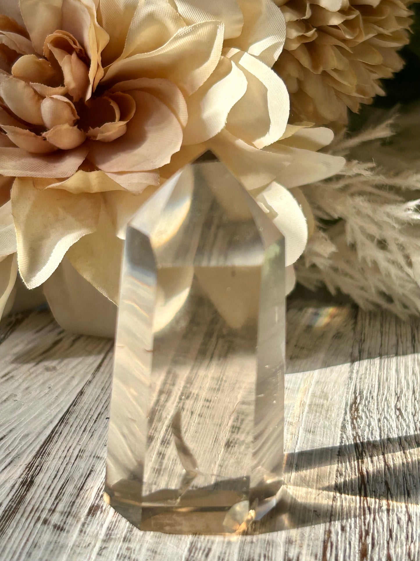 Polished Citrine tower displaying warm honey-gold tones, natural crystal inclusions, and beautiful clarity.