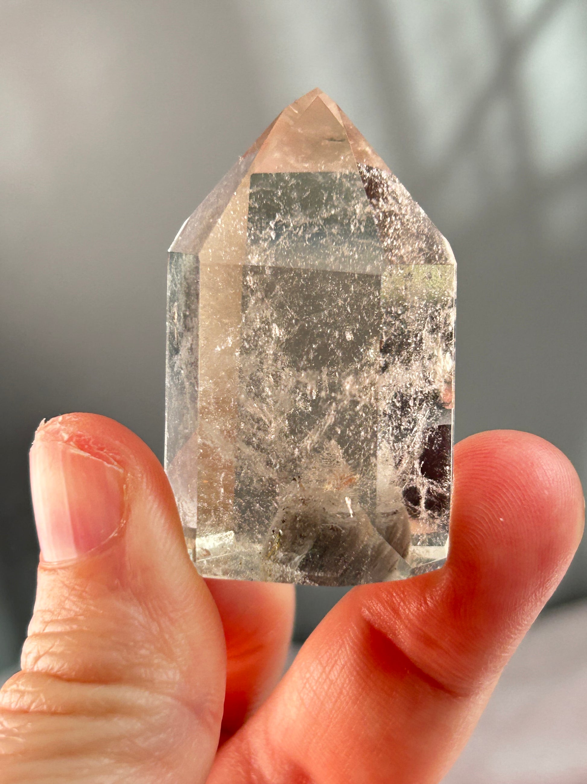 Grey Phantom Quartz tower from Brazil with soft grey internal phantoms and polished point
