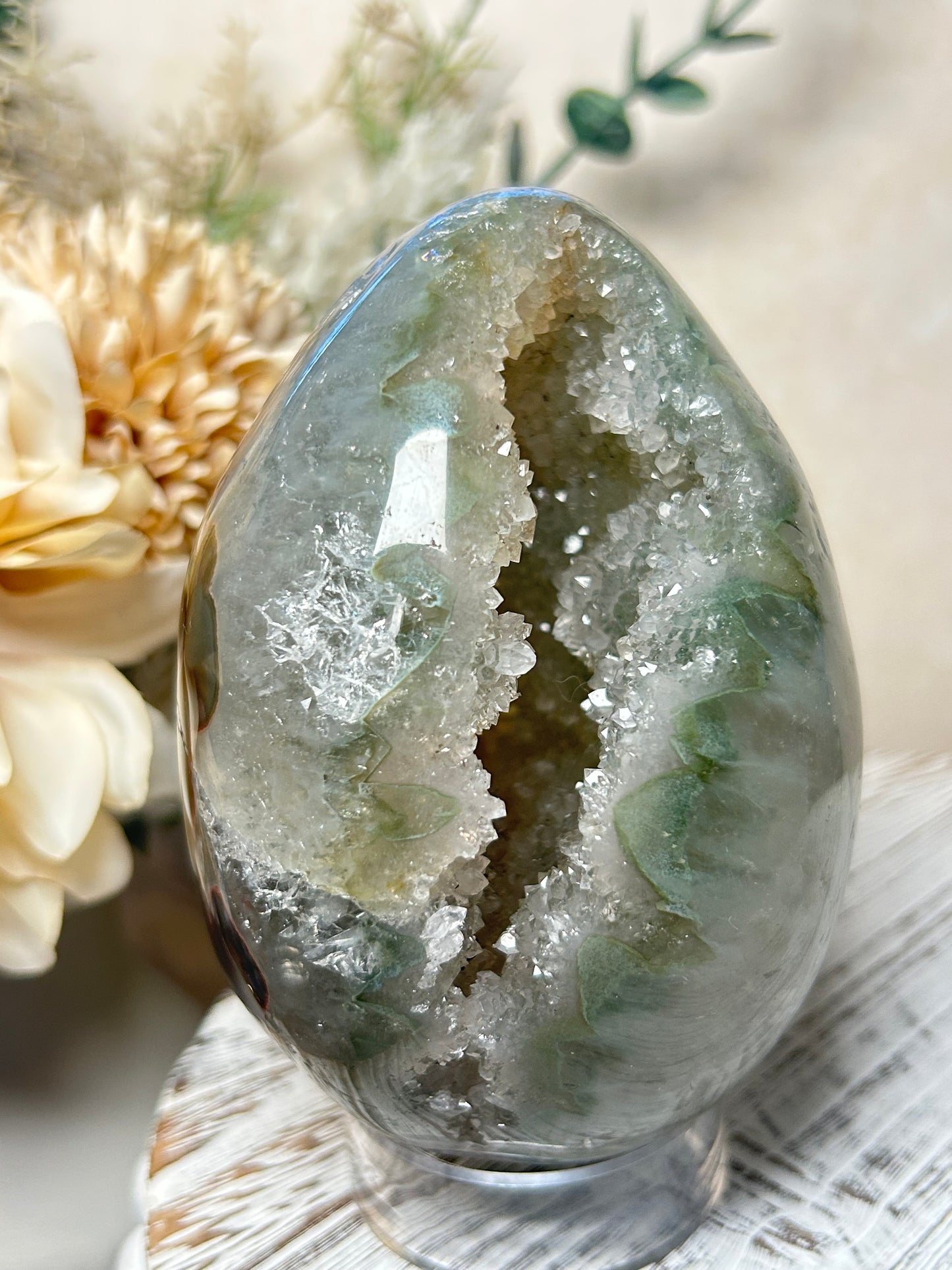 Rainbow Amethyst crystal egg displaying sparkle and layered Agate patterns