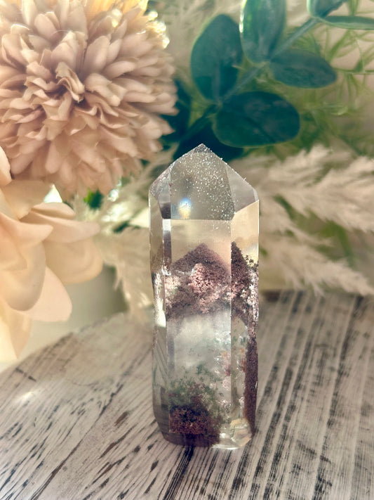 Inclusion Quartz Tower with natural mineral inclusions, polished clear Quartz, and unique internal crystal formations.