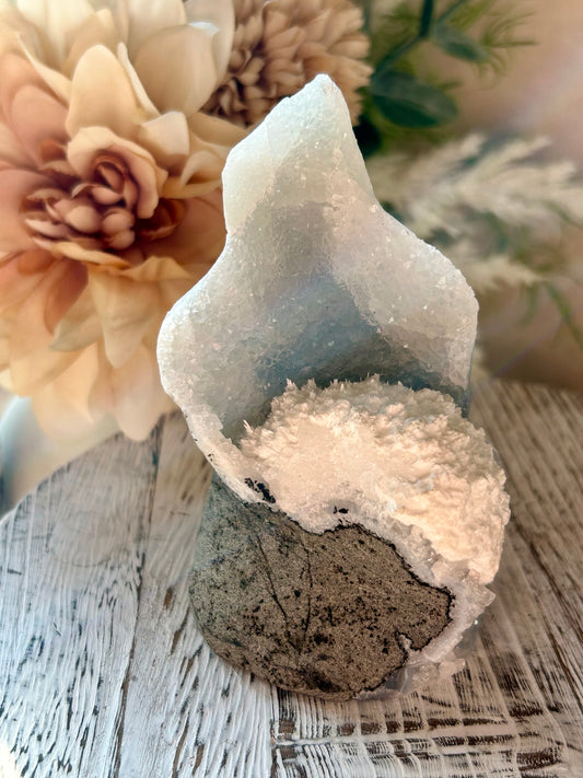 Natural Okenite on Grey Chalcedony with fibrous white formations and natural basalt matrix.