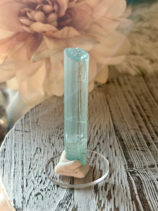 Natural Aquamarine rods from Pakistan with soft blue crystal formations and elongated natural growth.