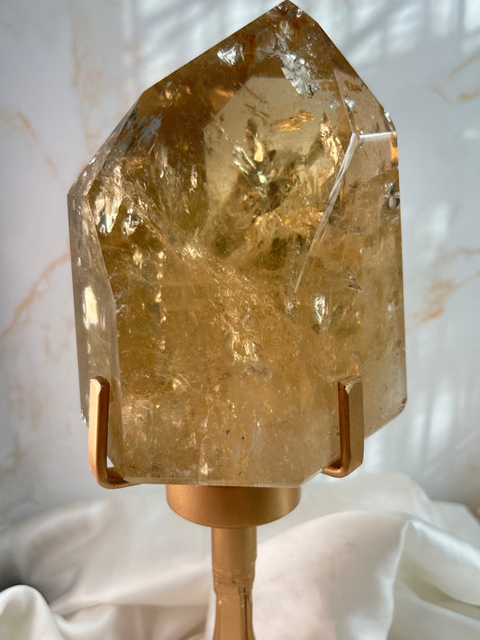 Close-up of premium Brazilian Citrine crystal tower with golden inclusions