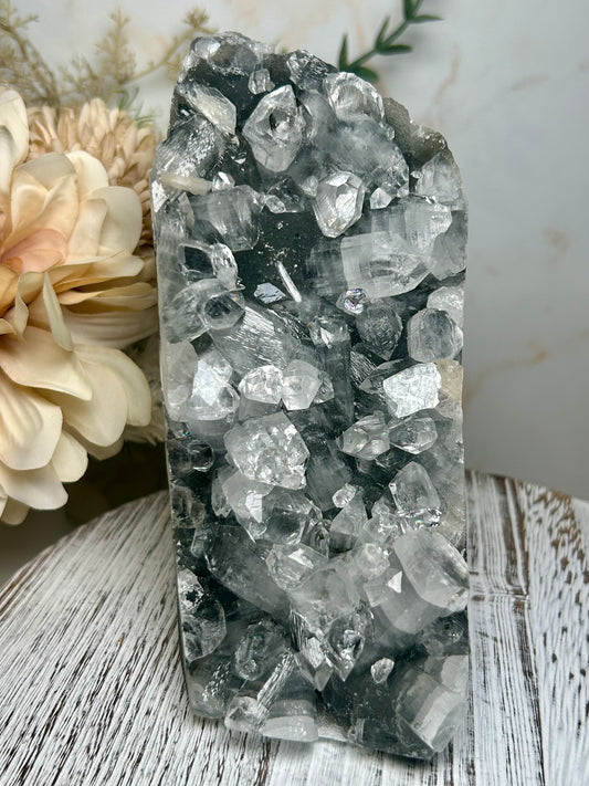 Self-standing apophyllite crystal cluster on shimmering grey chalcedony matrix from India