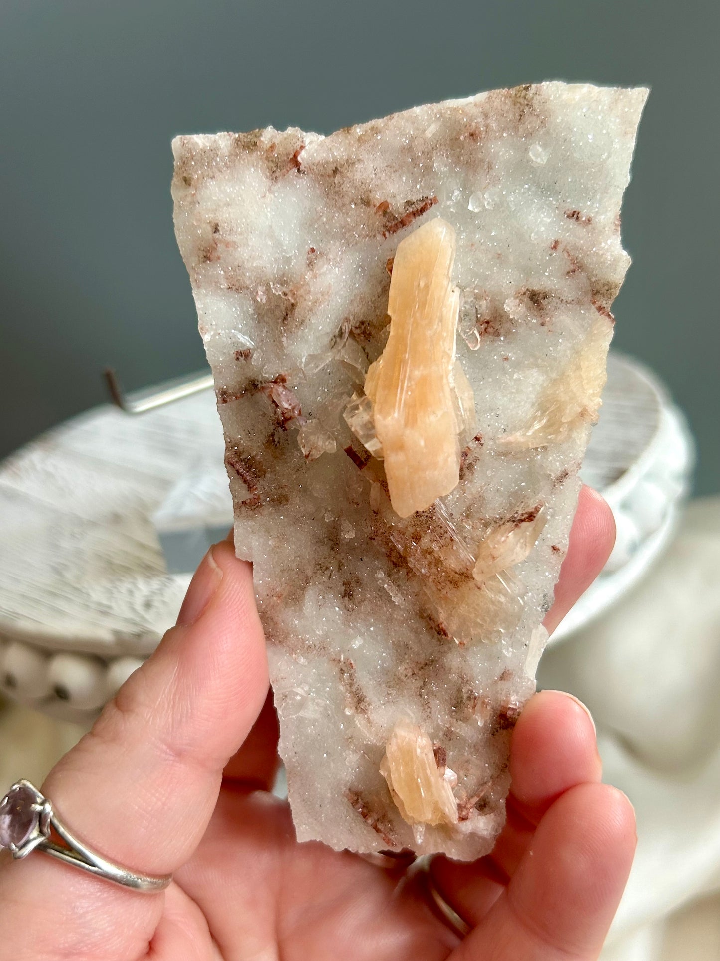 Clear apophyllite stalactite cluster on display, sparkling crystal formation