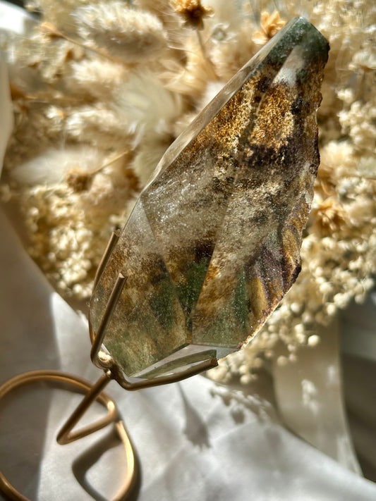 Large semi polished colourful Lodolite on gold display stand