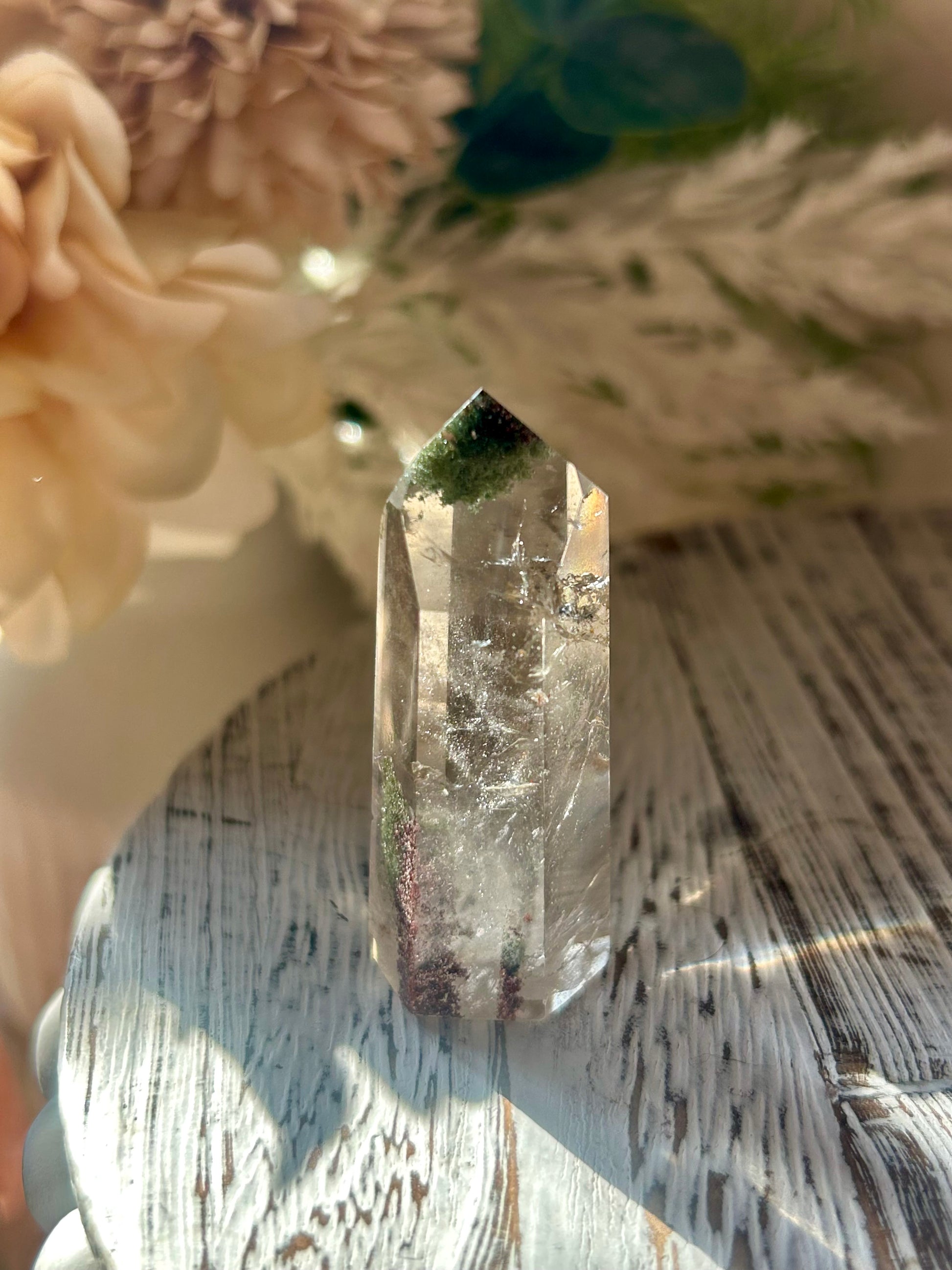 Inclusion Quartz Tower with natural mineral inclusions, polished clear Quartz, and unique internal crystal formations.