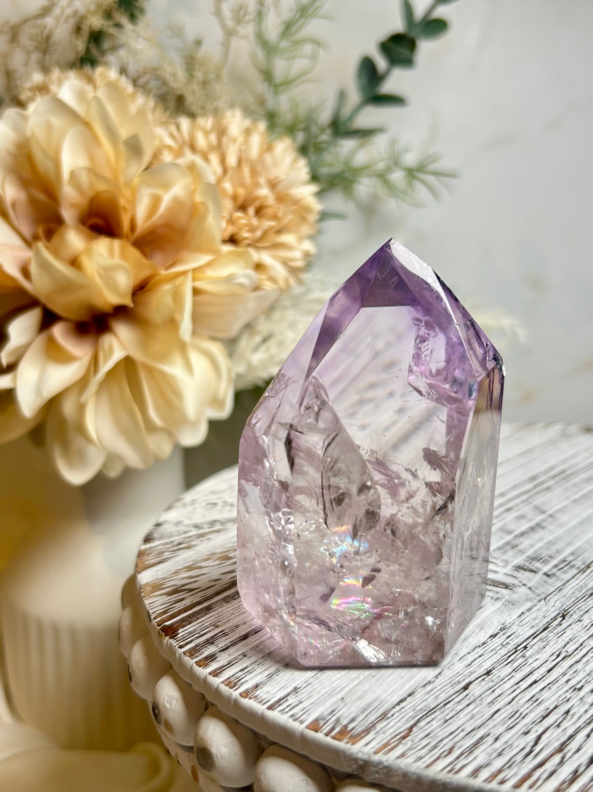 Powellite included Amethyst crystal point with natural lavender tones and internal mineral formations