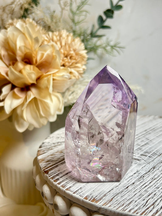 Powellite included Amethyst crystal point with natural lavender tones and internal mineral formations