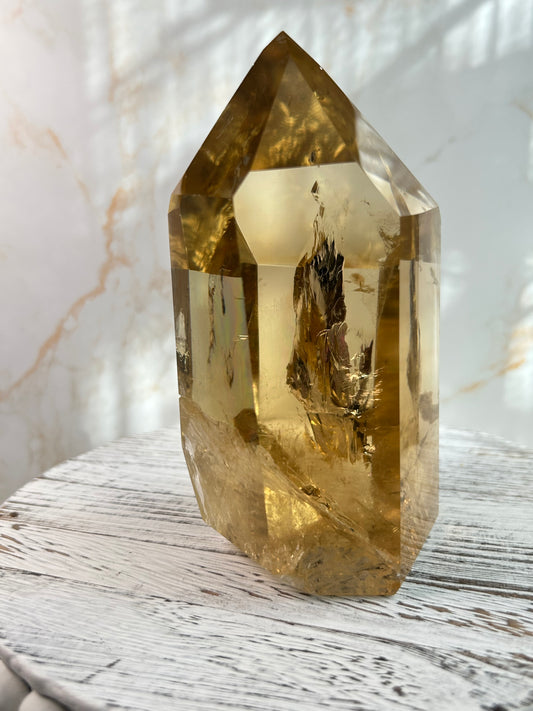 Close-up of premium Brazilian Citrine crystal tower with golden inclusions