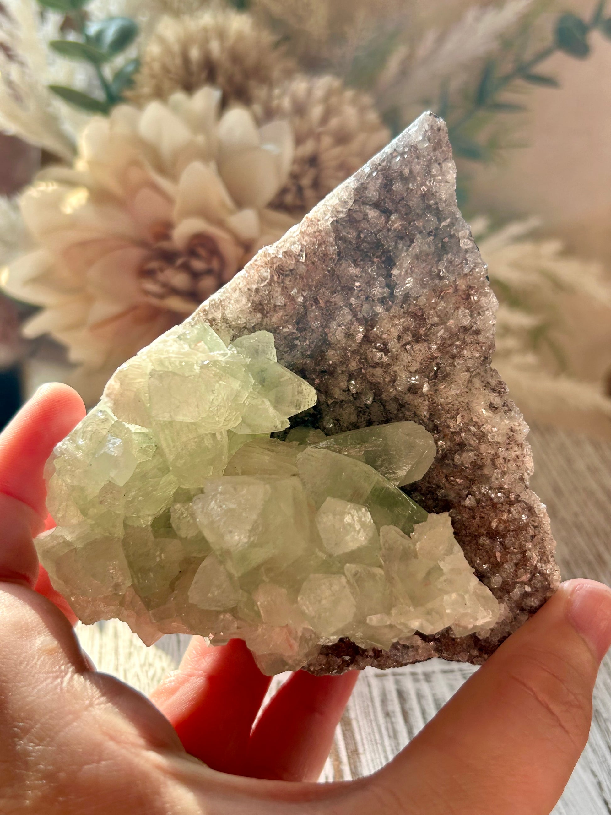 Green Apophyllite on Red Chalcedony cluster with sparkling green crystals and natural red mineral matrix.