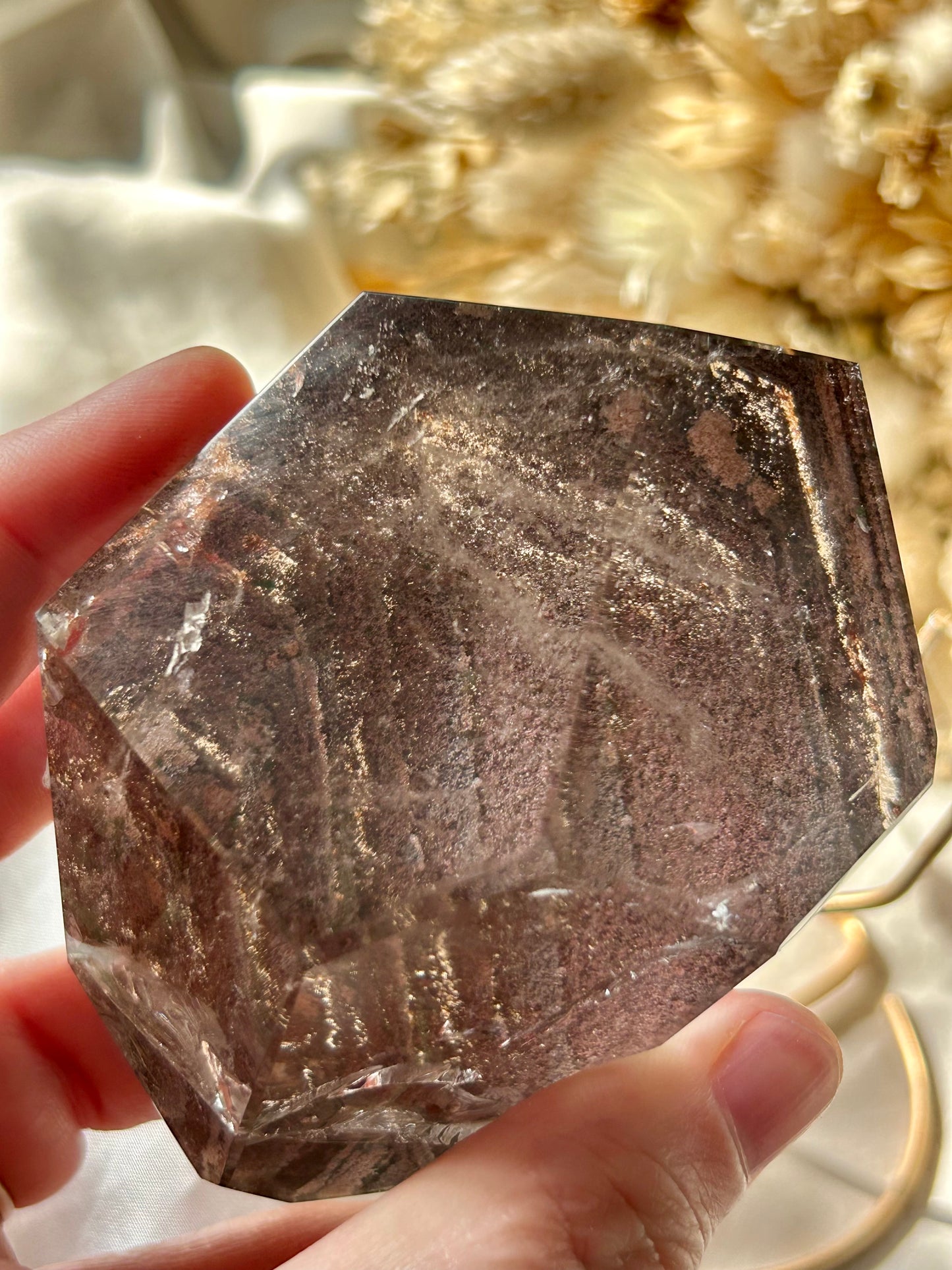 Large semi polished Lodolite on gold display stand