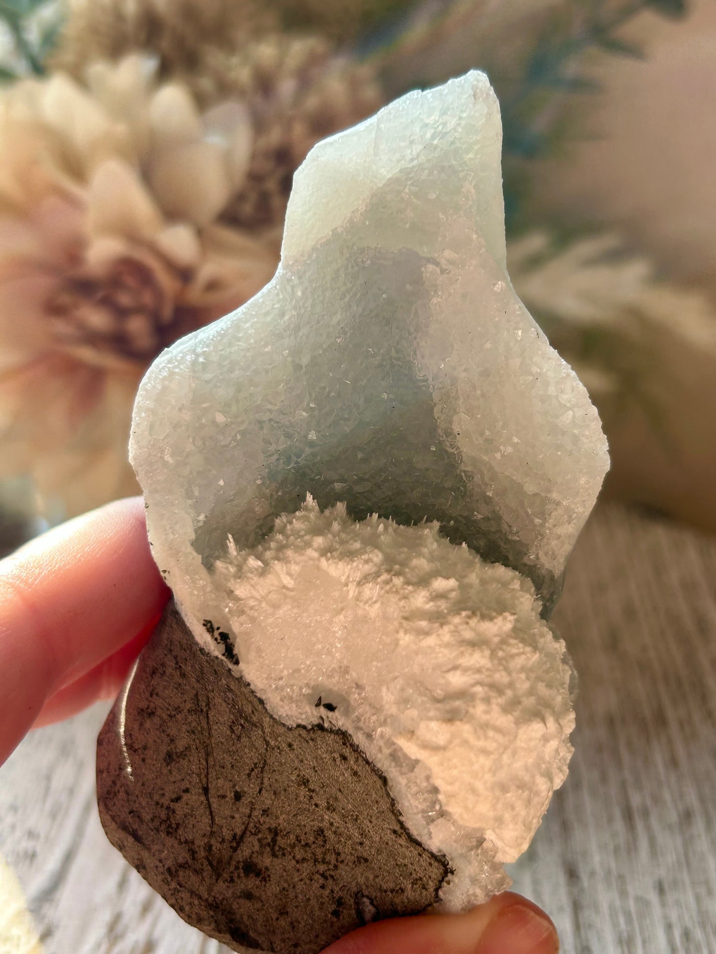 Natural Okenite on Grey Chalcedony with fibrous white formations and natural basalt matrix.