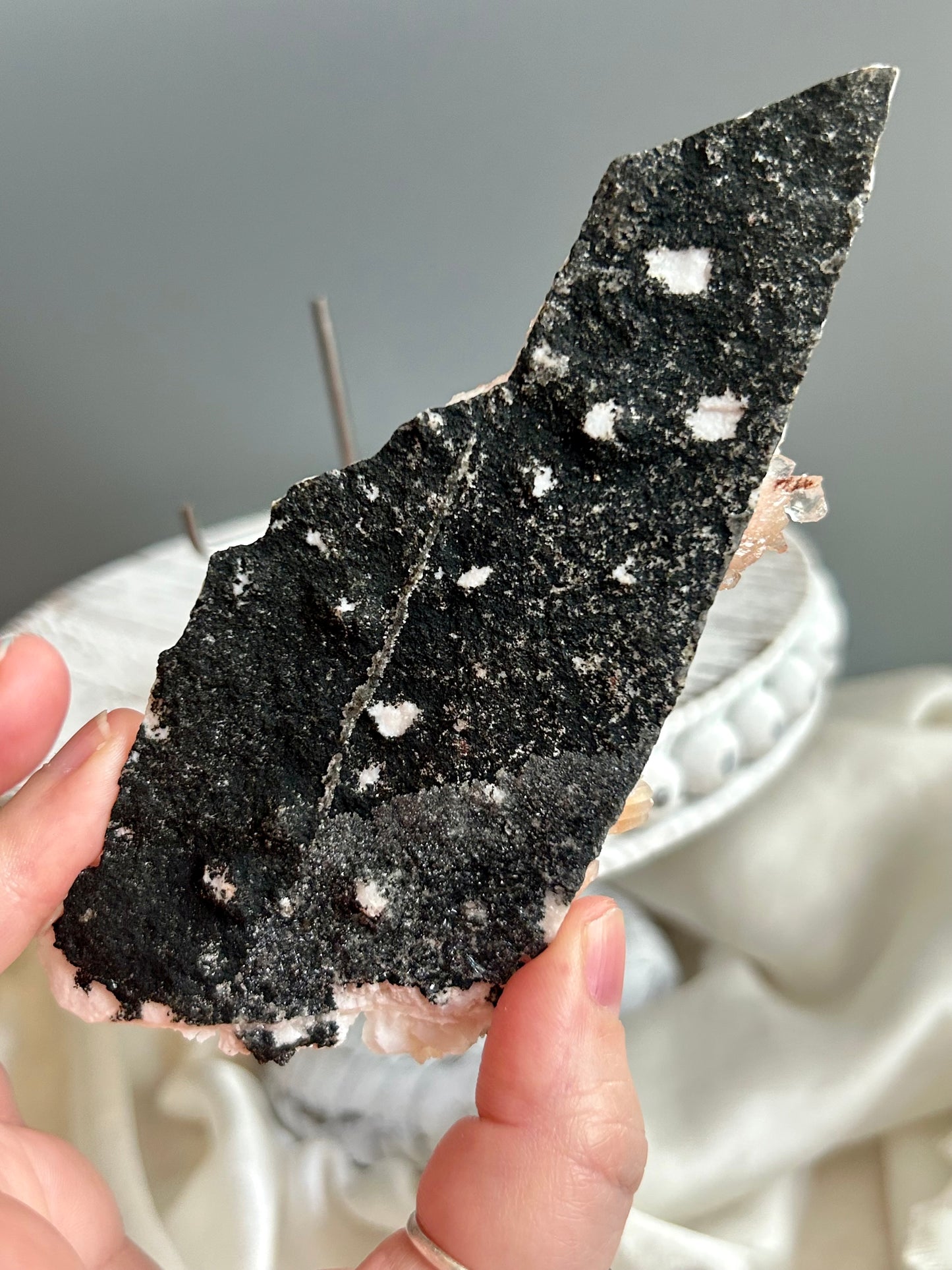Clear apophyllite stalactite cluster on display, sparkling crystal formation