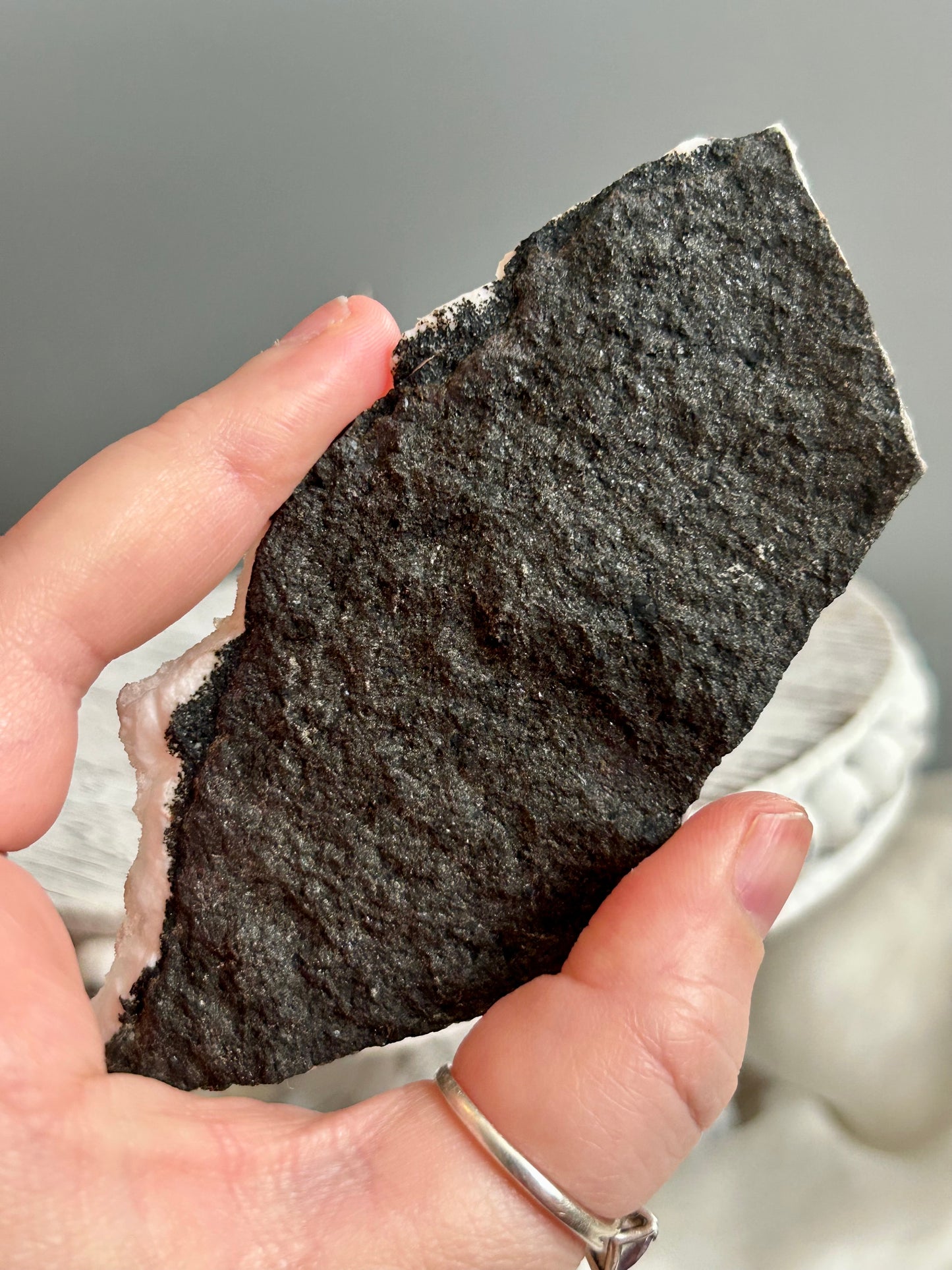 Clear apophyllite stalactite cluster on display, sparkling crystal formation