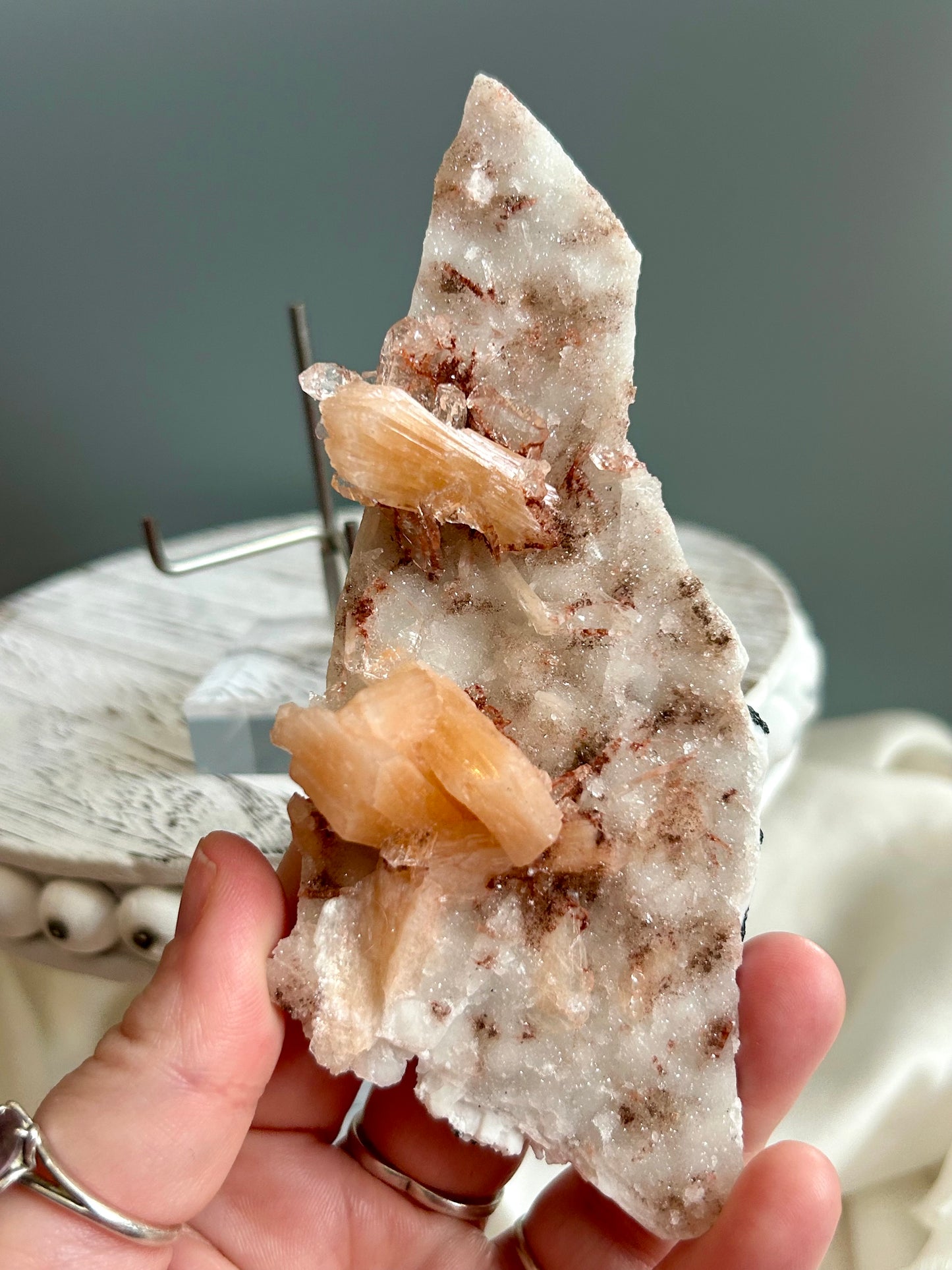 Clear apophyllite stalactite cluster on display, sparkling crystal formation
