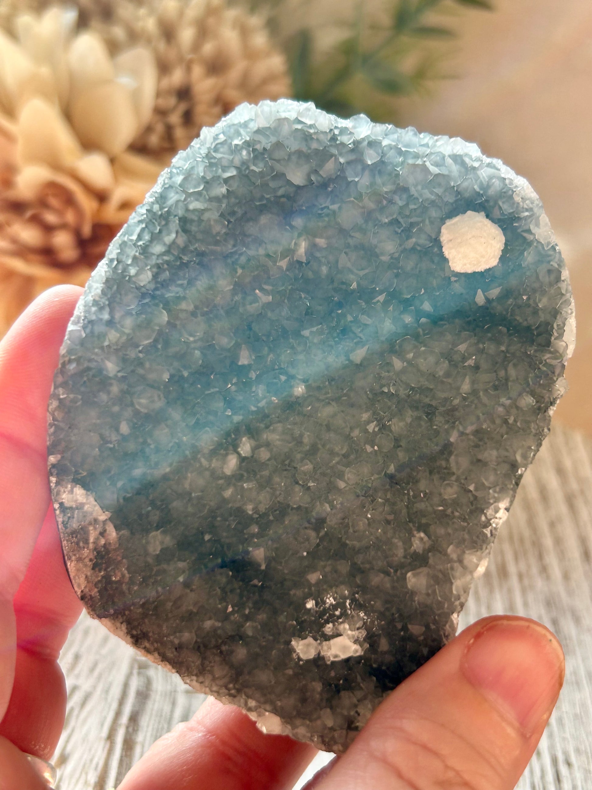 Natural Okenite on Grey Chalcedony with fibrous white formations and natural basalt matrix.