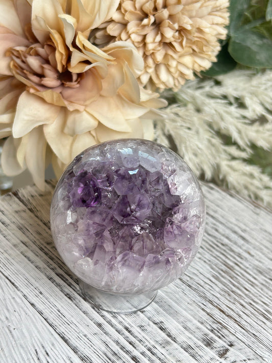 Purple Druzy Amethyst sphere with sparkling crystal pockets and polished violet quartz.