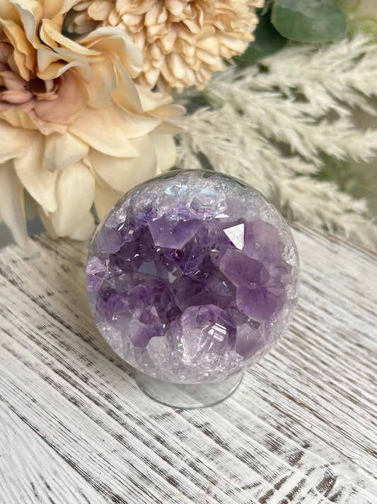 Purple Druzy Amethyst sphere with sparkling crystal pockets and polished violet quartz.