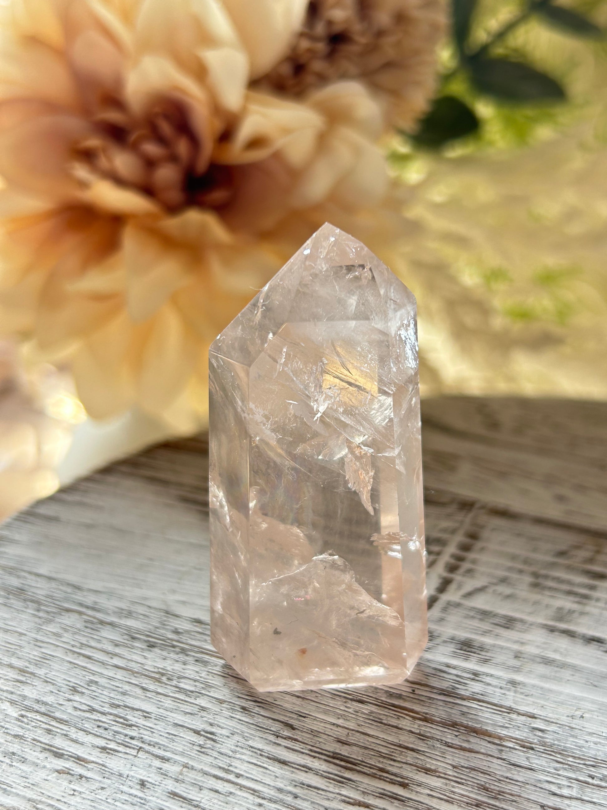 Beautiful polished Rose Quartz with calming blush tones, natural clarity, and glossy crystal finish.