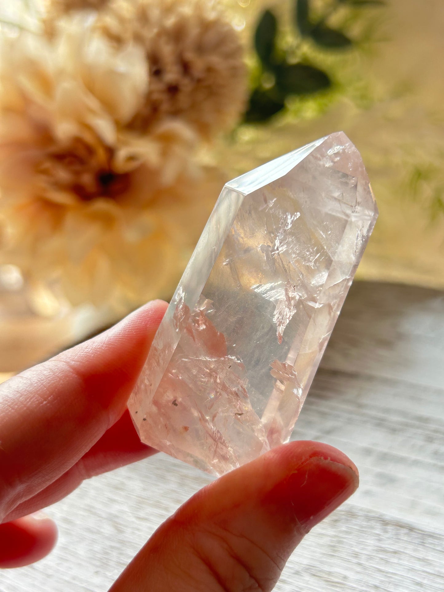 Beautiful polished Rose Quartz with calming blush tones, natural clarity, and glossy crystal finish.