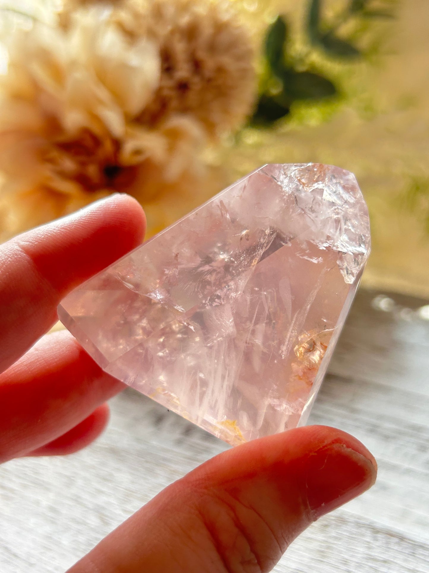 Beautiful polished Rose Quartz with calming blush tones, natural clarity, and glossy crystal finish.