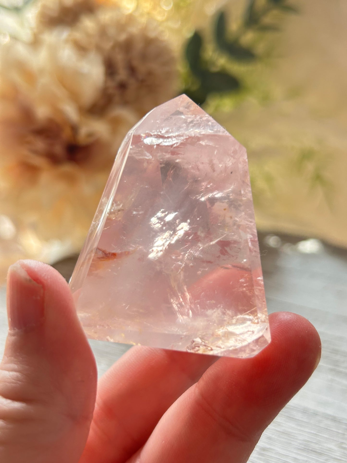 Beautiful polished Rose Quartz with calming blush tones, natural clarity, and glossy crystal finish.