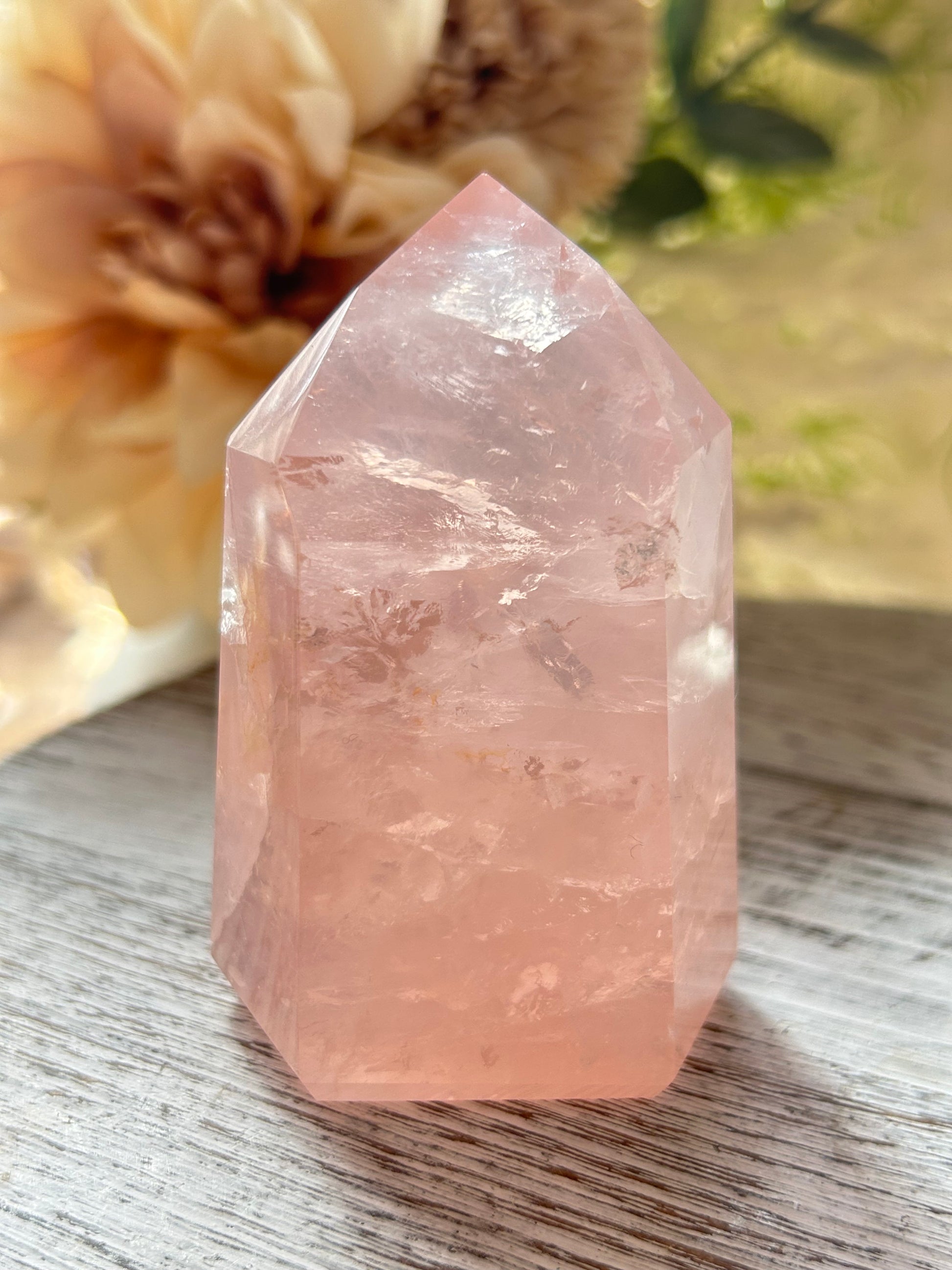 Beautiful polished Rose Quartz with calming blush tones, natural clarity, and glossy crystal finish.