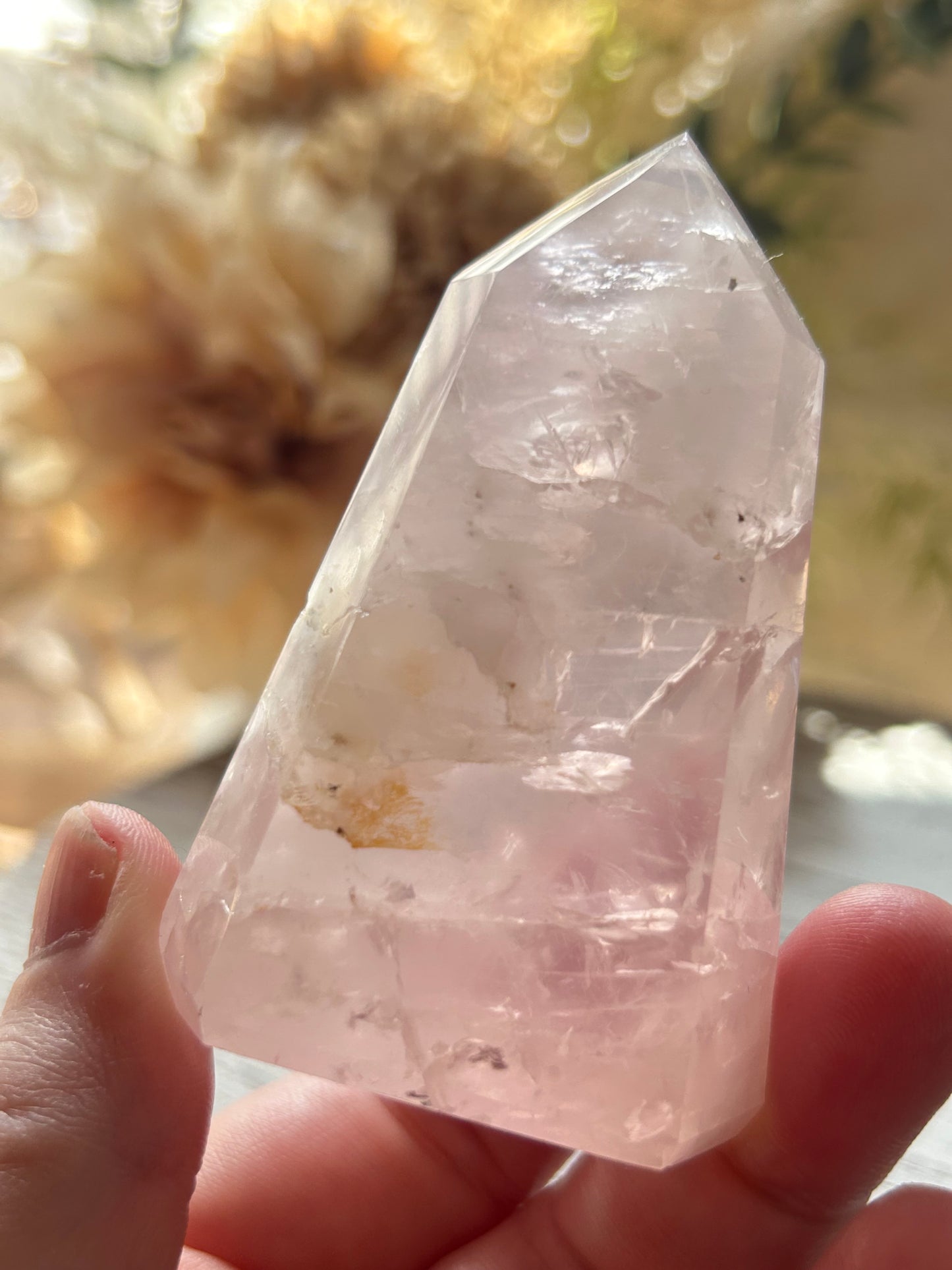 Beautiful polished Rose Quartz with calming blush tones, natural clarity, and glossy crystal finish.