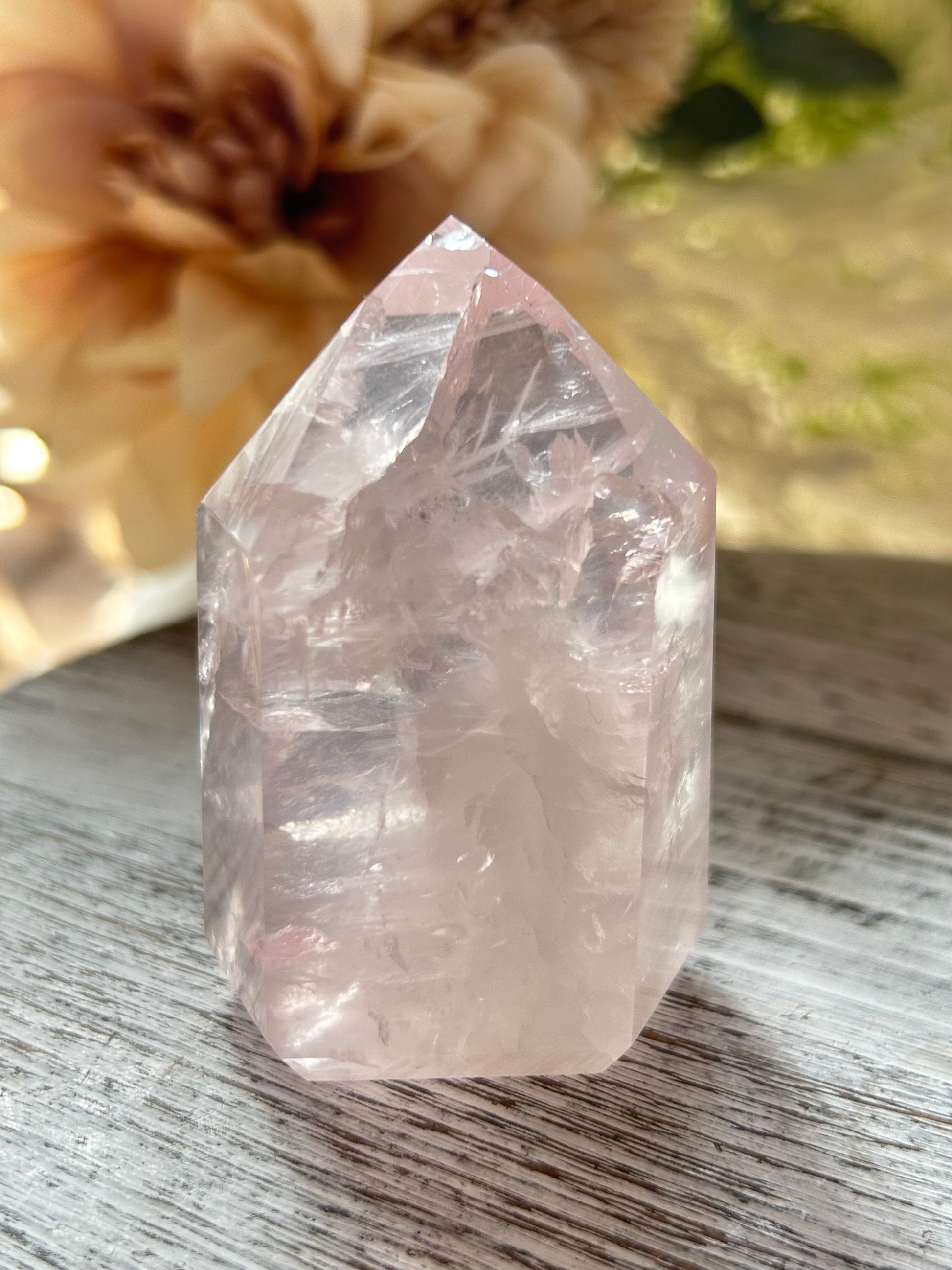 Beautiful polished Rose Quartz with calming blush tones, natural clarity, and glossy crystal finish.