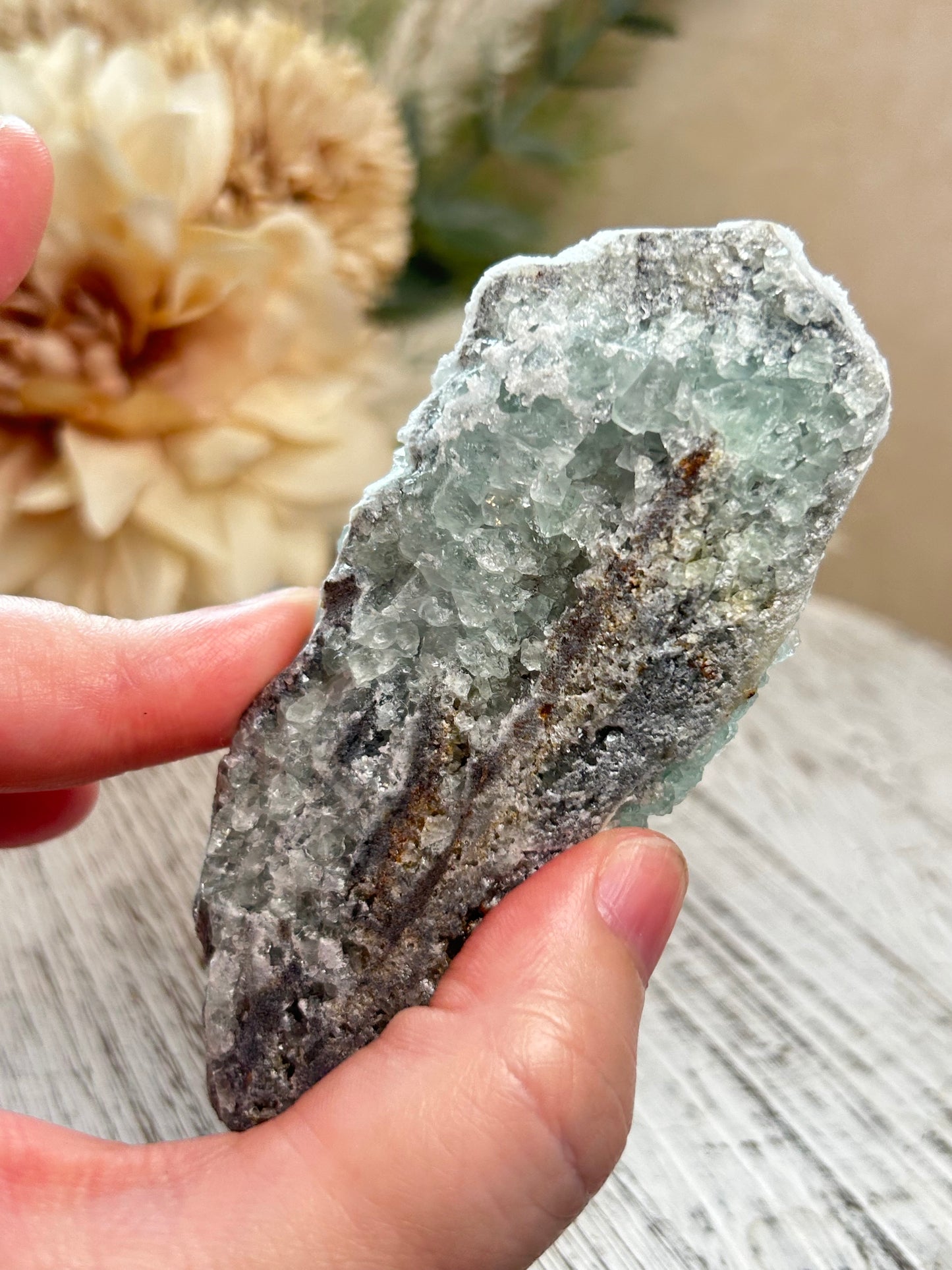Green Sugar Fluorite cluster with sparkling druzy crystal texture, natural raw formation, and soft mint green tones.