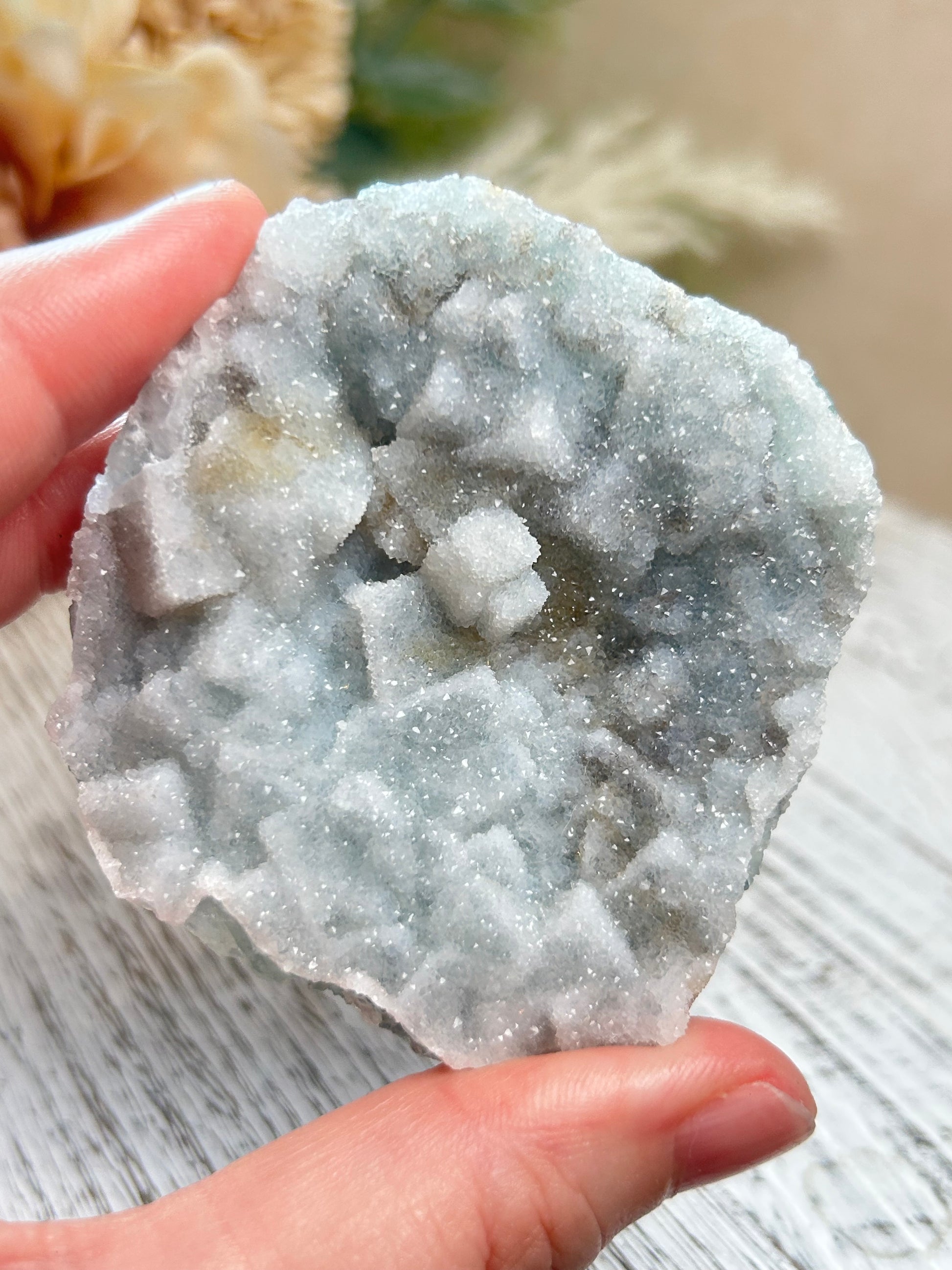 Green Sugar Fluorite cluster with sparkling druzy crystal texture, natural raw formation, and soft mint green tones.
